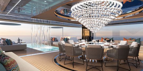 Le coin repas avec vue sur la piscine
